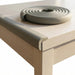 Protector de bordes en color gris para mayor seguridad en casa