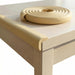 Protector de bordes en color beige para mayor seguridad en casa