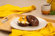 Donuts Bombón, el capricho más irresistible, Pack de 6 unidades. Disfruta de la tierna masa de Donuts de siempre, ahora recubierta con una crujiente y deliciosa capa de chocolate. Bimbo - detalle