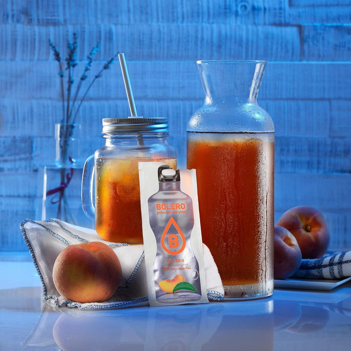 Bolero Sticks Té Helado Sabor Melocotón, Caja de 12x3g. El preparado en polvo para tu botella de agua, sin azúcar y con Stevia para una hidratación instantánea y refrescante. Bolero - detalle