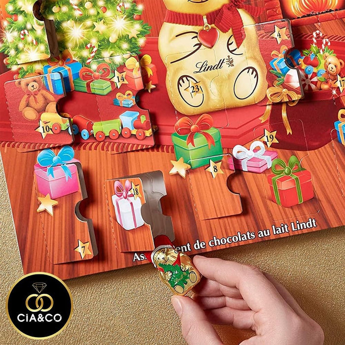 Calendario de Adviento Lindt Teddy 2024 con 24 bombones y chocolates surtidos de 170gr. Incluye una tarjeta de felicitación personalizable de Cia&Co para un regalo único. Cia&Co - presentacion