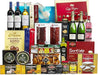 Cesta de Navidad Cia&Co Lote B809, Selección Gourmet. Un completo lote navideño con Whisky DYC, Cava, vino, ibéricos y un gran surtido de dulces. El regalo perfecto para sorprender. Cia&Co - frontal