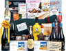 Cesta de Navidad con Paleta Ibérica Cebo Cia&Co Lote A302. Un regalo gourmet de prestigio con una Paleta Ibérica de Cebo, bebidas premium, ibéricos, queso y un gran surtido de dulces. Cia&Co - frontal
