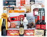 Cesta de Navidad con Paleta Serrana Cia&Co Lote A301. Un regalo gourmet que lo tiene todo: Paleta Reserva, Whisky, Cava, vinos, ibéricos de bellota y un festín de dulces navideños. Cia&Co - frontal