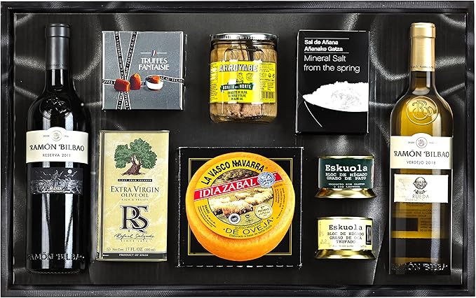 Cesta de Navidad Gourmet Cia&Co Lote B108 en Caja de Madera. Un regalo premium con Paleta Ibérica de Bellota, bebidas de primeras marcas y un surtido de dulces, todo en una caja de madera. Cia&Co - frontal