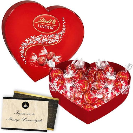 Corazón con 200g de Bombones LINDT LINDOR de Chocolate con Leche. Un regalo para San Valentín con tarjeta personalizada Cia&Co y caja reutilizable en forma de corazón. Cia&Co - frontal
