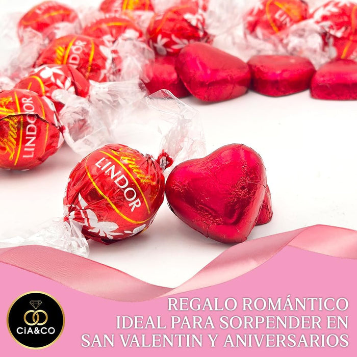Corazón con 200g de Bombones LINDT LINDOR de Chocolate con Leche. Un regalo para San Valentín con tarjeta personalizada Cia&Co y caja reutilizable en forma de corazón. Cia&Co - presentacion