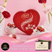 Corazón con 200g de Bombones LINDT LINDOR de Chocolate con Leche. Un regalo para San Valentín con tarjeta personalizada Cia&Co y caja reutilizable en forma de corazón. Cia&Co - zoom