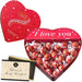 Lata de Corazón con 250g de Bombones Lindt Lindor y Tarjeta Personalizable Cia&Co. Un regalo de San Valentín o aniversario con cremosos bombones de chocolate con leche. Cia&Co - frontal