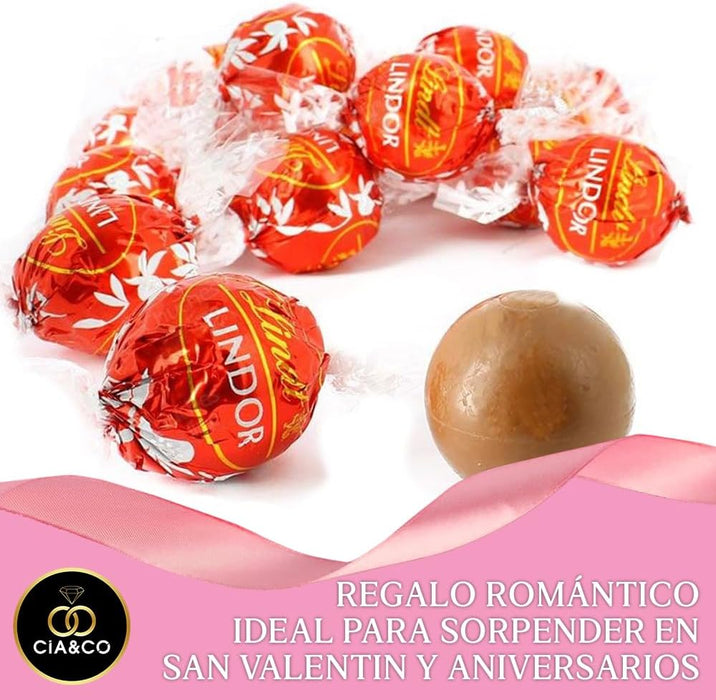 Lata de Corazón con 250g de Bombones Lindt Lindor y Tarjeta Personalizable Cia&Co. Un regalo de San Valentín o aniversario con cremosos bombones de chocolate con leche. Cia&Co - lateral