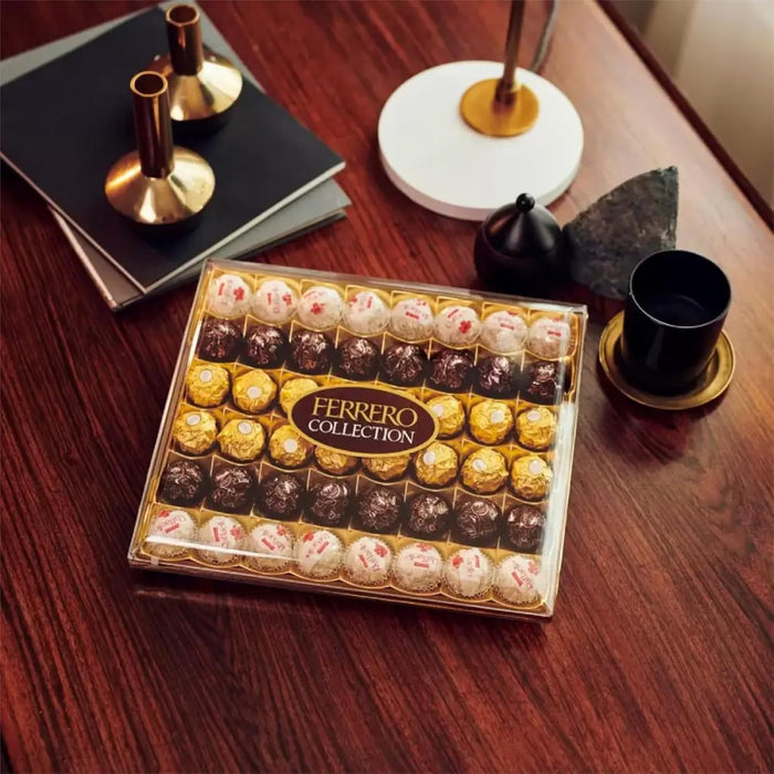 Ferrero Collection, Surtido de 48 Bombones Premium (518g). Descubre una selección irresistible con el clásico Ferrero Rocher, el exótico Raffaello y el intenso Rondnoir. Ferrero Rocher - detalle