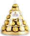Ferrero Rocher Pirámide de Navidad, 28 Bombones (350g). Un centro de mesa espectacular con el icónico bombón de chocolate y avellanas, perfecto para decorar y compartir en tus fiestas. Ferrero Rocher - lateral