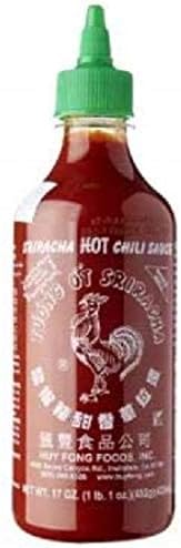 Huy Fong Sriracha Salsa Picante de Chile (435ml): La icónica "salsa del gallo" original, elaborada con chiles madurados al sol para un sabor intenso y auténtico. Flying Goose - frontal