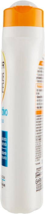 Garnier Ambre Solaire Leche Protectora Solar Hidratante SPF 30, 200 ml. Fórmula con Vitamina C antioxidante para una piel suave, sedosa y protegida del sol. Garnier - lateral