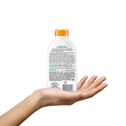 Garnier Ambre Solaire Niños Leche Protectora Solar SPF 30, Pack de 3 (3x200ml). Alta Protección Hidratante y Resistente al Agua para la Piel Delicada de los Niños. Garnier - pack
