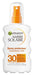 Garnier Ambre Solaire Spray Protector Hidratación 24h FPS 30, 200 ml. Alta protección UVA/UVB con Manteca de Karité nutritiva para una piel suave, sedosa e hidratada. Garnier - frontal