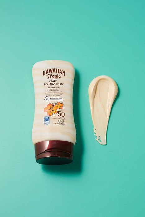 Hawaiian Tropic Silk Hydration Loción Solar Protectora SPF 50, 180ml. Disfruta de una alta protección UVA/UVB mientras mimas tu piel con 12 horas de hidratación y un irresistible aroma tropical. Hawaiian Tropic - extra
