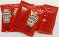 Caja de 50 Sobres Monodosis de Ketchup Heinz (50x12g). El formato individual ideal para llevar, para hostelería o para un control perfecto de las raciones en casa. Heinz - frontal