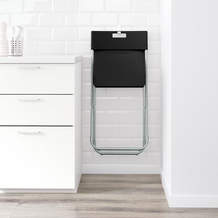 Ikea GUNDE Silla Plegable, Negro. La solución perfecta y económica para tener asientos extra. Ligera, resistente y fácil de guardar, es ideal para visitas, eventos y espacios pequeños. Ikea - pack