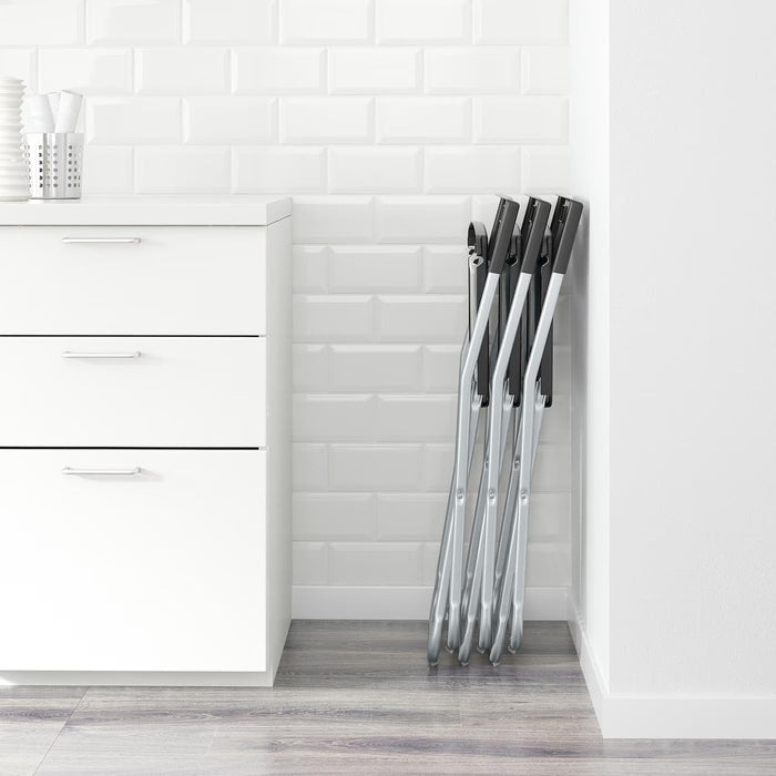 Ikea GUNDE Silla Plegable, Negro. La solución perfecta y económica para tener asientos extra. Ligera, resistente y fácil de guardar, es ideal para visitas, eventos y espacios pequeños. Ikea - uso