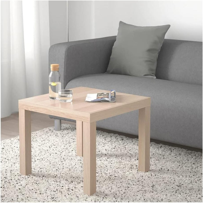 Mesa Auxiliar IKEA LACK de 55x55 cm en efecto roble teñido blanco. Un mueble icónico, ligero y fácil de montar, ideal como mesa de centro, mesita de noche o soporte. Ikea - uso