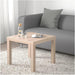 Mesa Auxiliar IKEA LACK de 55x55 cm en efecto roble teñido blanco. Un mueble icónico, ligero y fácil de montar, ideal como mesa de centro, mesita de noche o soporte. Ikea - uso