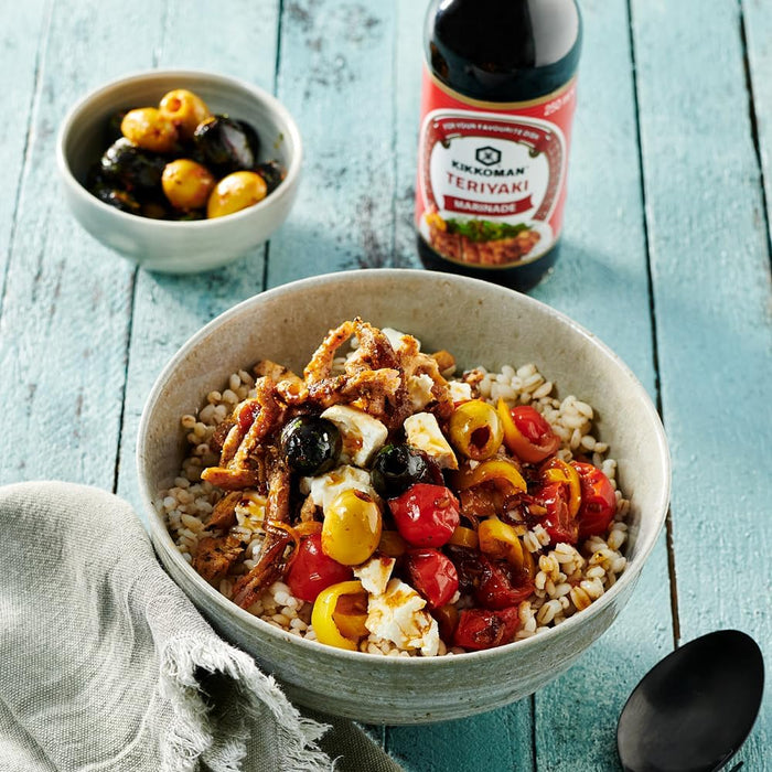 Kikkoman Salsa Teriyaki para Marinar y Glasear, 250ml. La auténtica salsa japonesa para dar un sabor exótico, dulce y un brillo espectacular a tus carnes, pescados y verduras. Kikkoman - lateral