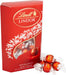 Caja de Bombones Lindt Lindor Cornet de Chocolate con Leche (337g). Aproximadamente 26 bombones con el inconfundible corazón cremoso que se funde en tus sentidos. Lindt - lateral