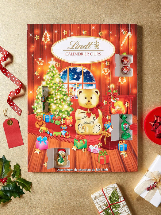 Calendario de Adviento Lindt con 24 Bombones de Chocolate con Leche (172g) y Tarjeta Regalo Sorpresa IKEA. Un detalle navideño con la calidad de los Maestros Chocolateros. Lindt - zoom