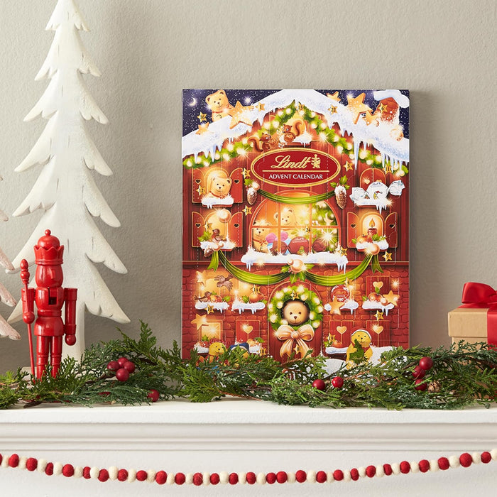 Calendario de Adviento Lindt con 24 sorpresas de chocolate y bombones surtidos, 170g. Incluye figuras de Ositos Lindt y cremosos bombones Lindor para una Navidad mágica. Lindt - extra