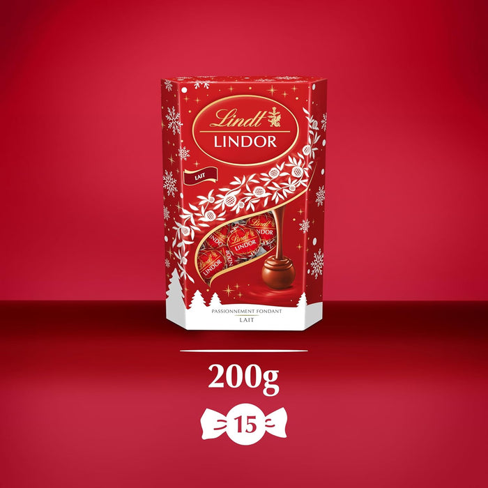 Cornet de Bombones Lindt Lindor de Chocolate con Leche (200g). El formato icónico para regalar o compartir, con el corazón irresistiblemente cremoso que se funde en tu boca. Lindt - presentacion