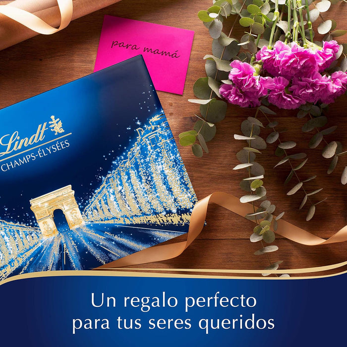 Lindt CHAMPS-ÉLYSÉES Caja de Bombones Surtidos, 469g. Un exquisito viaje por la alta chocolatería con una selección de pralinés únicos, ideal para regalar y compartir en momentos especiales. Lindt - lateral