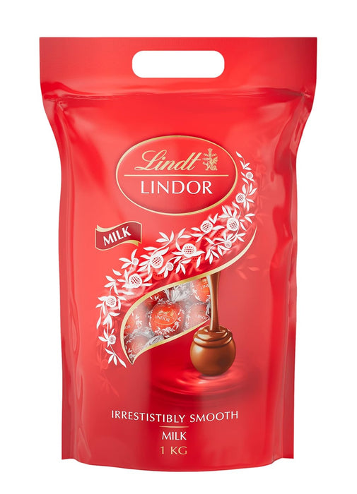 Lindt LINDOR Bombones de Chocolate con Leche, Bolsa de 1kg (Aprox. 80 bolas). Tu reserva personal de felicidad con el bombón más cremoso, perfecto para darte un capricho cada día. Lindt - extra