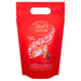 Lindt LINDOR Bombones de Chocolate con Leche, Bolsa de 1kg (Aprox. 80 bolas). Tu reserva personal de felicidad con el bombón más cremoso, perfecto para darte un capricho cada día. Lindt - pack