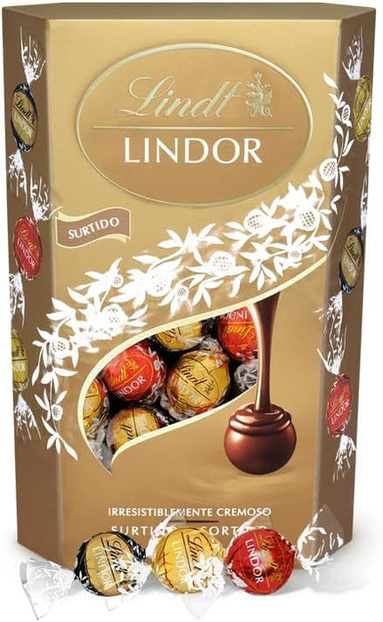 Lindt LINDOR Cornet Surtido de Bombones de Chocolate, 337g. Descubre un mundo de placer con este surtido que incluye los irresistibles bombones de chocolate con leche, blanco y negro 70%. Lindt - frontal
