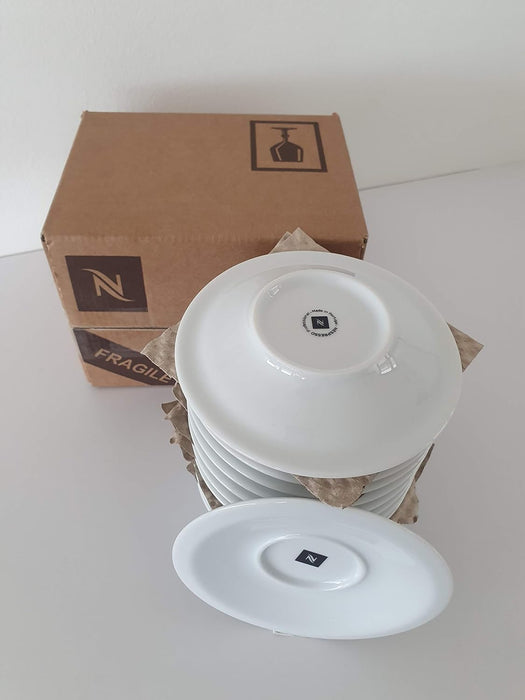Nespresso Professional, Set de 12 Platos para Tazas de Espresso. Fabricados en porcelana de alta calidad, son el complemento perfecto para tus tazas de café espresso y para un servicio profesional.
