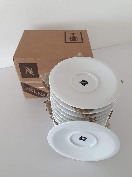 Nespresso Professional, Set de 12 Platos para Tazas de Espresso. Fabricados en porcelana de alta calidad, son el complemento perfecto para tus tazas de café espresso y para un servicio profesional. Nespresso - frontal