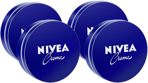 NIVEA Creme, Pack de 4 Latas de 75ml. El formato de viaje de la crema multiusos más icónica. Hidratación intensiva para llevar siempre contigo en el bolso, la maleta o el neceser. Nivea - frontal