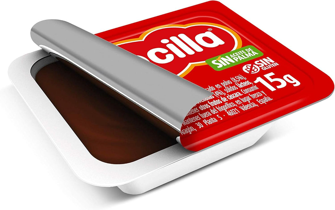 Nocilla Original, Estuche de 72 Porciones Individuales de 15g. El formato más práctico y limpio para disfrutar del sabor de siempre, sin aceite de palma y sin gluten. Ideal para hostelería y familias. Nocilla - detalle