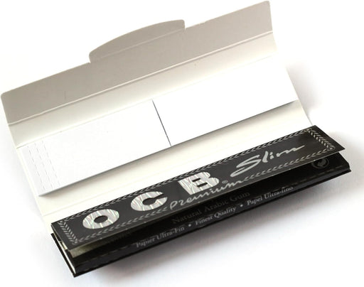 OCB Premium 1 1/4, Pack de 25 Librillos de Papel de Fumar. El papel de liar negro más icónico en un formato práctico, con 50 hojas ultrafinas por librillo para una combustión lenta. Ocb - pack