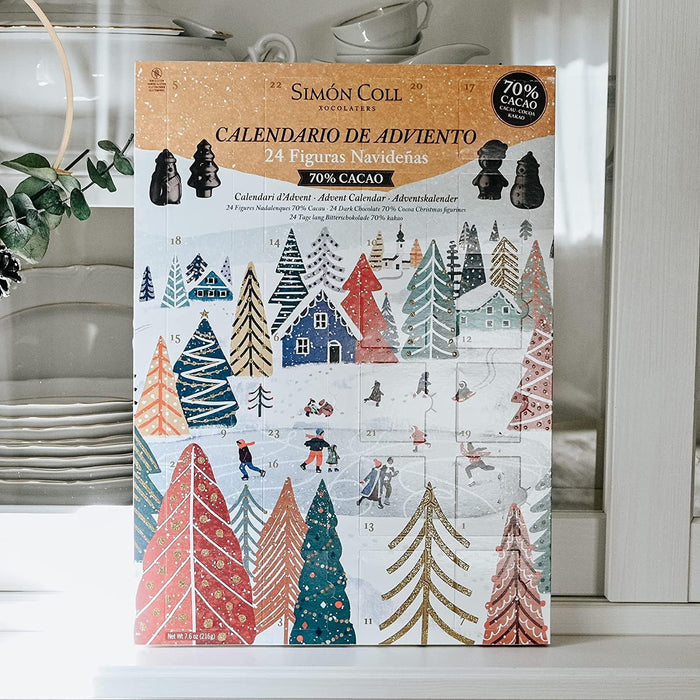 Calendario de Adviento Simón Coll con 24 figuras 3D de Chocolate Negro 70% Cacao, 216gr. Un regalo gourmet sin gluten ni aceite de palma para los amantes del sabor intenso. Simon Coll - lateral