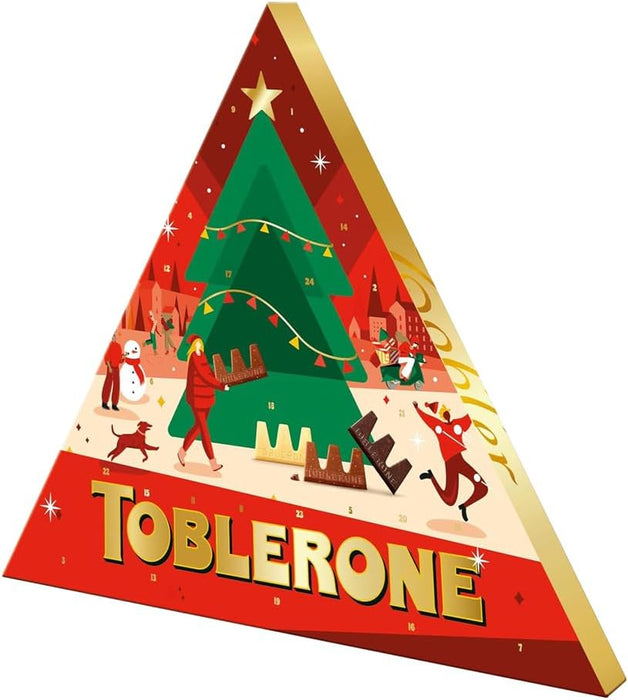 Calendario de Adviento Toblerone con 200g de chocolate suizo. Incluye una deliciosa selección de mini chocolatinas con miel y almendras para una Navidad triangularmente perfecta. Toblerone - extra