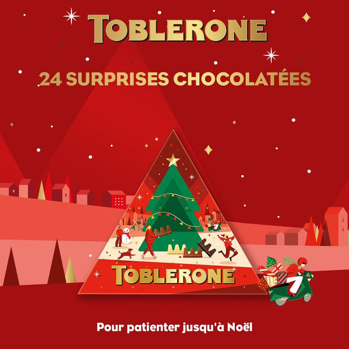 Calendario de Adviento Toblerone con 200g de chocolate suizo. Incluye una deliciosa selección de mini chocolatinas con miel y almendras para una Navidad triangularmente perfecta. Toblerone - zoom