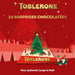 Calendario de Adviento Toblerone con 200g de chocolate suizo. Incluye una deliciosa selección de mini chocolatinas con miel y almendras para una Navidad triangularmente perfecta. Toblerone - zoom