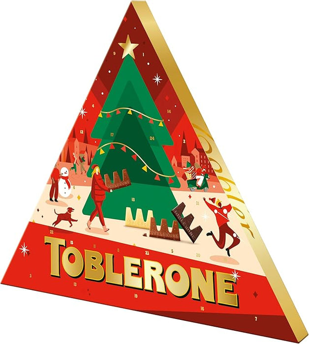 Calendario de Adviento Toblerone con 200g de chocolate suizo. Incluye una deliciosa selección de mini chocolatinas con miel y almendras para una Navidad triangularmente perfecta. Toblerone - frontal