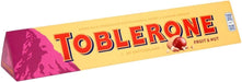 Toblerone Fruit & Nut, 400g. Chocolate con leche suizo con turrón de miel y almendras y pasas. La icónica barra triangular para compartir, regalar y disfrutar de una mezcla única. Toblerone - zoom