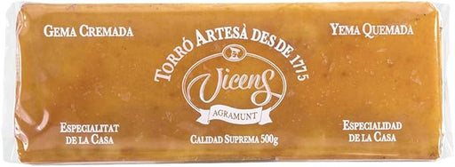 Torrons Vicens Turrón de Yema Quemada, formato grande de 500g. El clásico turrón artesanal con un 52% de almendra, textura suave y el inconfundible sabor de la yema tostada. Torrons Vicens - frontal