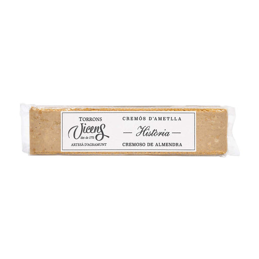 Torrons Vicens Turrón "Historia" Cremoso de Almendra, 300g. Una receta original recuperada por el maestro Àngel Velasco con almendra, avellana y un toque de galleta crujiente. Torrons Vicens - frontal