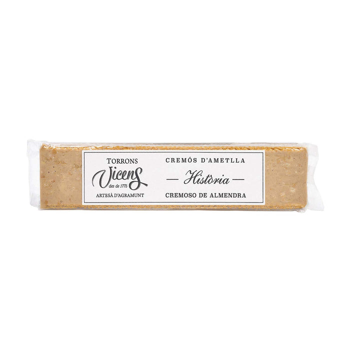 Torrons Vicens Turrón "Historia" Cremoso de Almendra, 300g. Una receta original recuperada por el maestro Àngel Velasco con almendra, avellana y un toque de galleta crujiente. Torrons Vicens - frontal