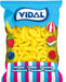 Vidal Golosinas Plátanos de Goma con Azúcar (Bolsa 1kg): Disfruta del auténtico sabor a plátano en este caramelo de goma sin gluten recubierto de azúcar. Vidal - frontal